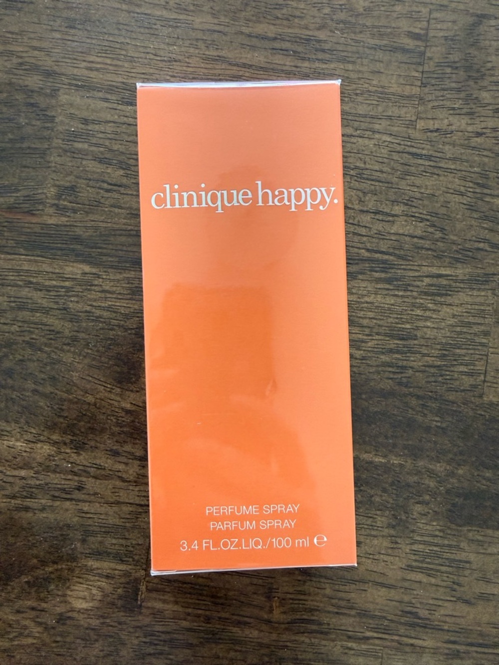 Clinique Happy Eau de Parfum in Vibrant Orange Packaging
